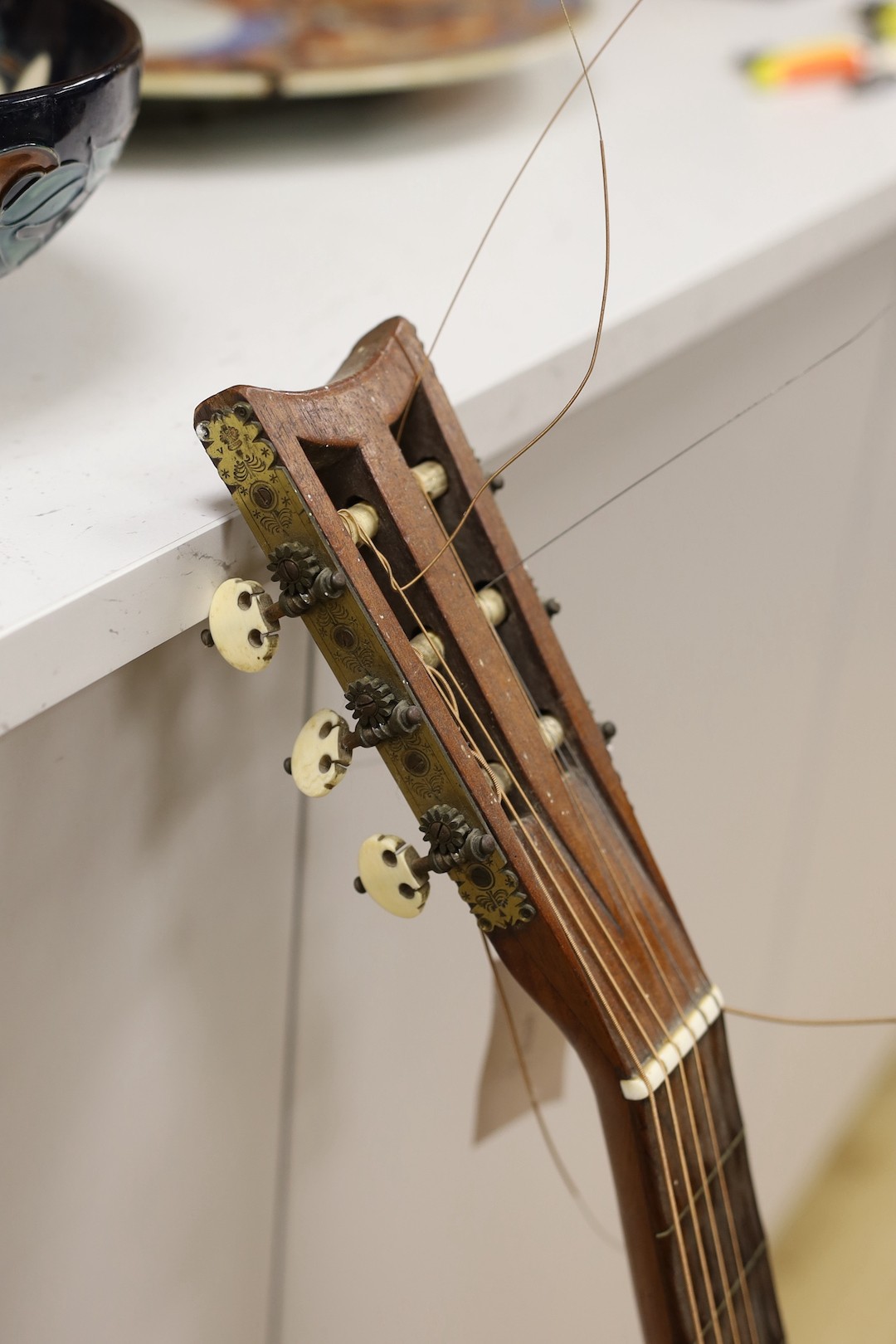 A Victorian parlour guitar
